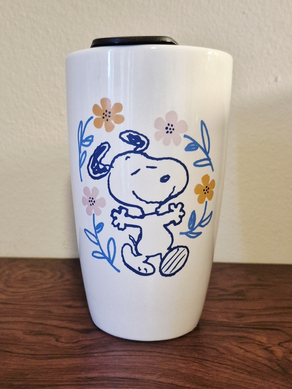 Peanuts Snoopy "Strolling Through Flowers" ceramic travel mug